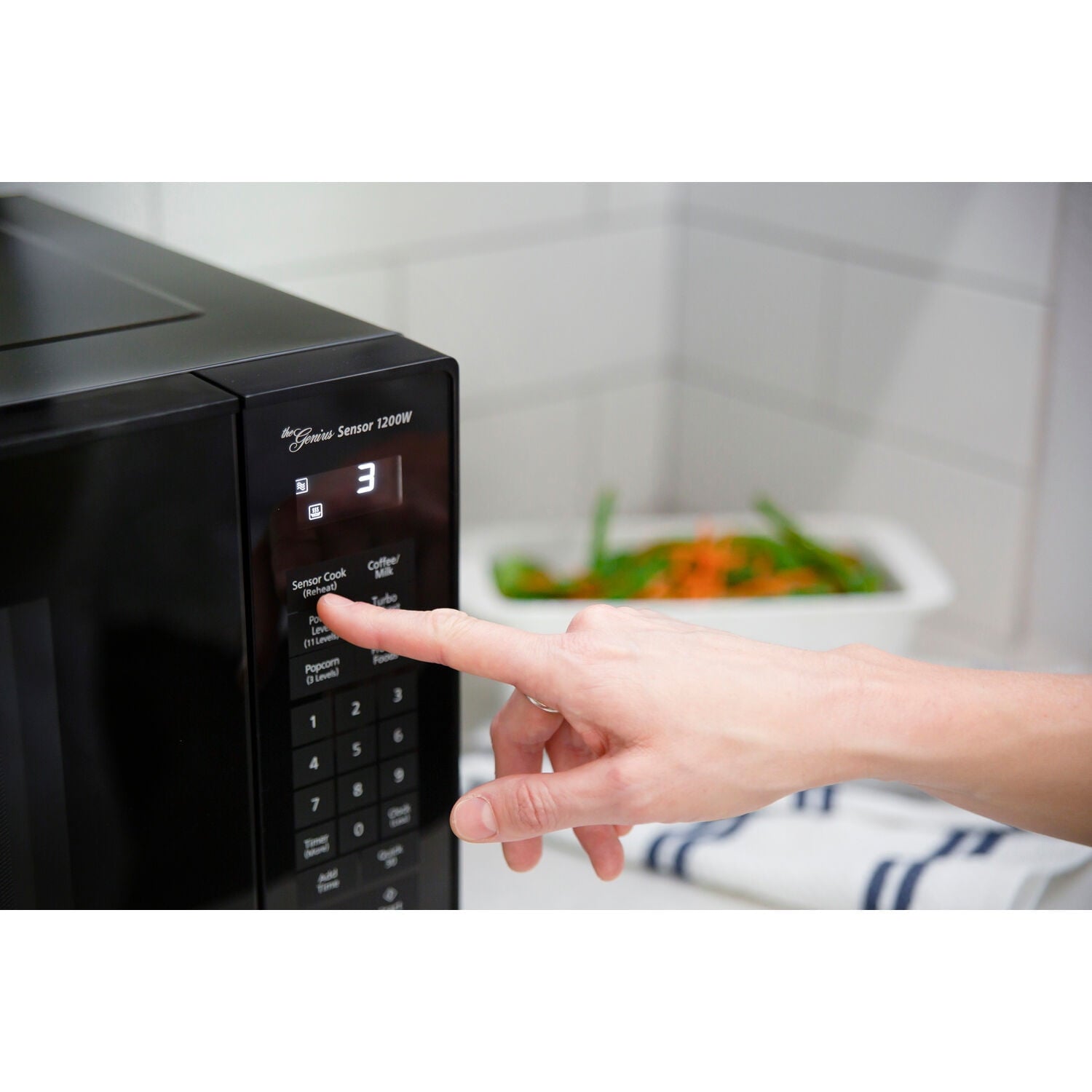 Panasonic 1.2 Cu. Ft. 1200W Genius Sensor Countertop Microwave Oven with Inverter Technology in Black
