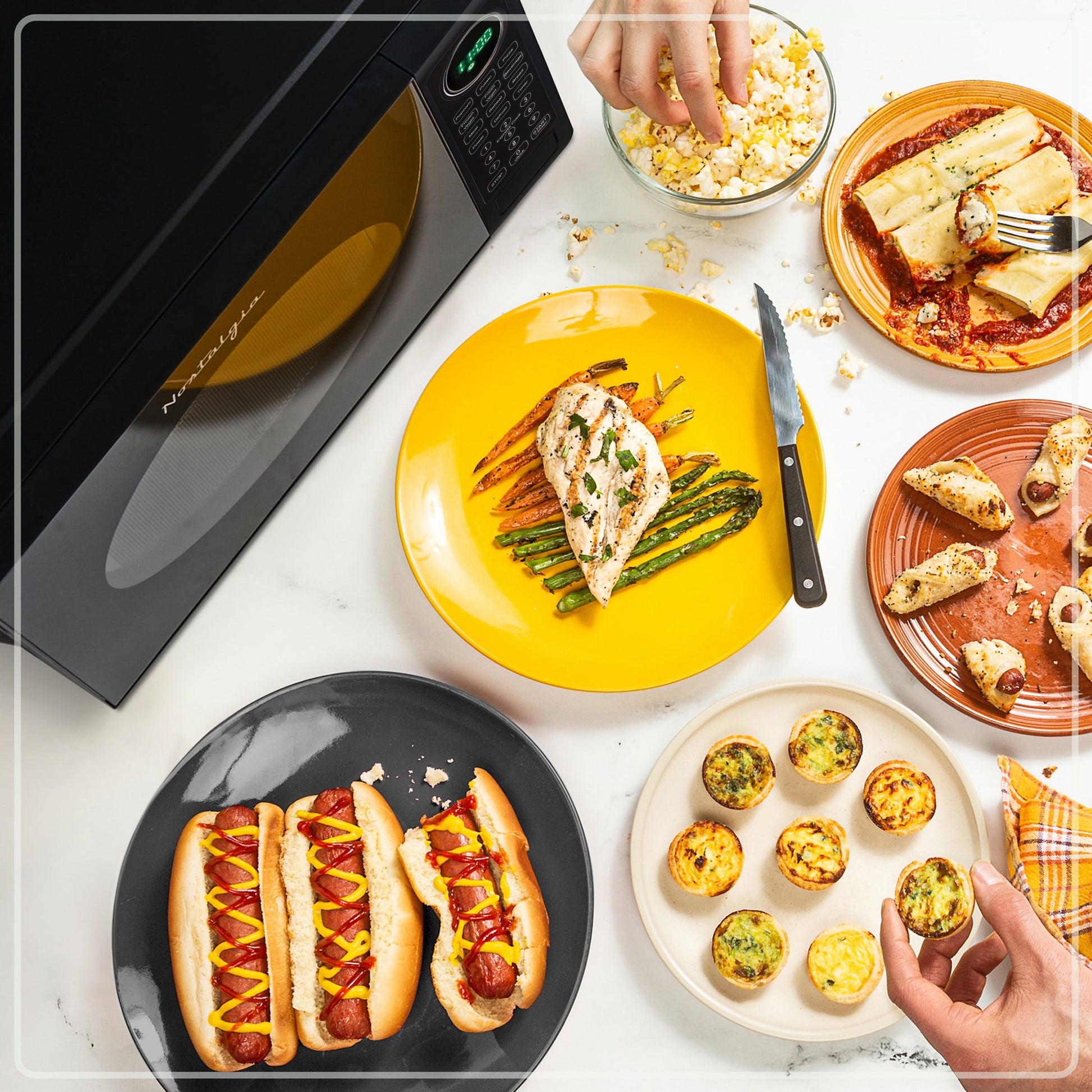 Nostalgia 0.7 Cu. ft. Modern Retro Set Countertop Microwave Oven in Black