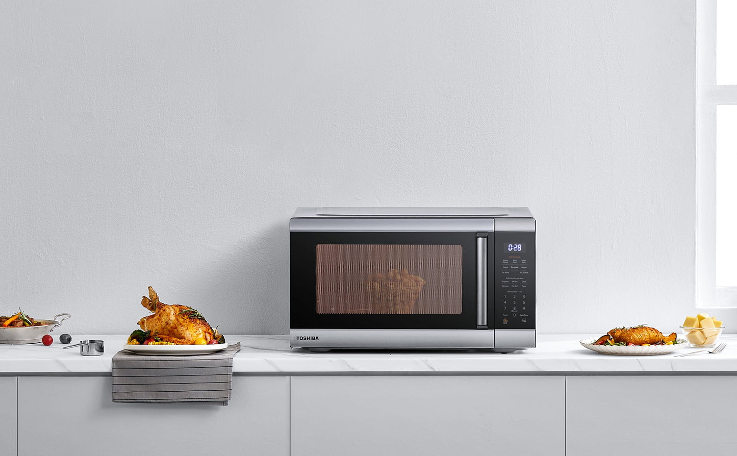 Toshiba 2.0 Cu. ft. Family-Size 1200-Watt Stainless Steel Microwave Oven with Sensor