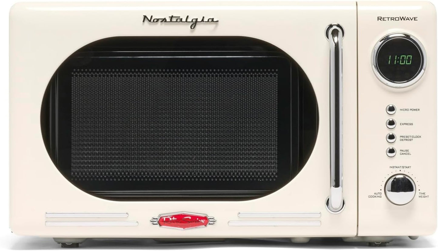 Nostalgia Retro Compact Countertop Microwave Oven - 0.7 Cu. Ft. - 700-Watts with LED Digital Display - Child Lock - Easy Clean Interior - Pink