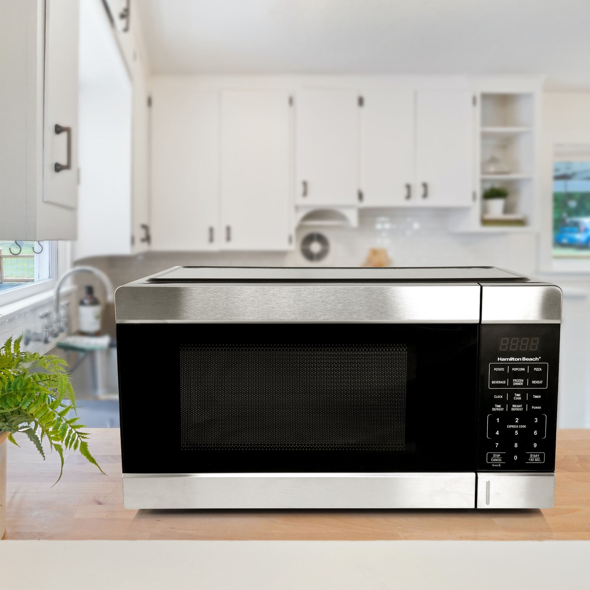 Hamilton Beach 1.1 Cu. Ft. 1000 Watt Countertop Microwave Oven in Black