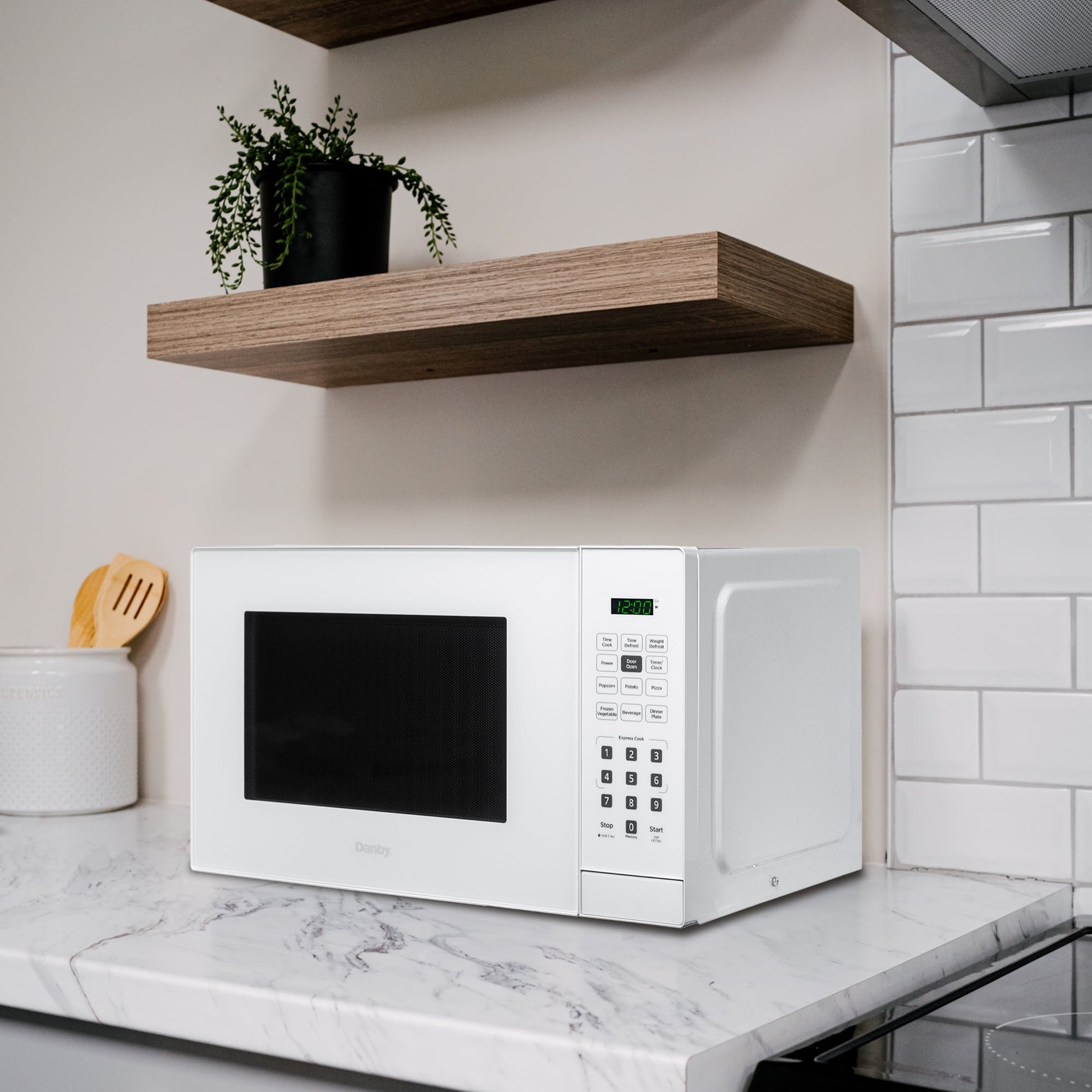 Danby 1.1 cu. ft. Countertop Microwave in White (DBMW1121BWW)