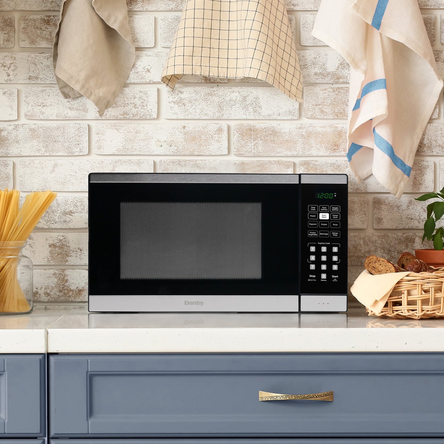 Danby 1.1 cu. ft. Countertop Microwave in Black and Stainless Steel (DBMW1126BBS)