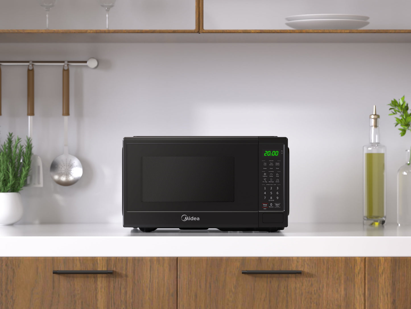 Midea 0.9 Cu. Ft. Countertop Microwave Oven, 6 Auto Programs, 10 Power Level, Black, EM9P022CVPMB