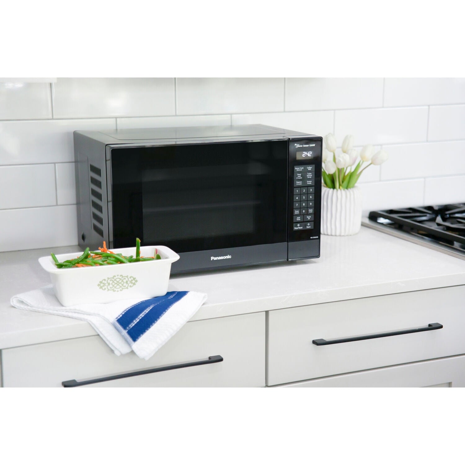 Panasonic 1.2 Cu. Ft. 1200W Genius Sensor Countertop Microwave Oven with Inverter Technology in Black